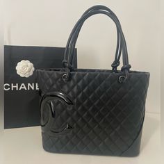 Chanel Cambon Bucket Large Tote Which Has Been Discontinued Since 2012 Is Absolutely Stunning Like Only Chanel Knows How To Do! Like Band New. W Honestly This Bag Is Priceless, You Can Not Find A Bag This Old Like Brand New, Pretty Much Impossible.. Will Be Extremely Hard To Give This Babe Up This Is A Medium To Large Size Tote And Brand New Never Used, 13.5 Inches Long Height Of Bag Is 10 Inches, (18 Inches From Top Of Strap To Bottom Of Bag And 6 Inches Deepcant Find This Bag Like Brand New Li Chanel Cambon, Chanel Tote, Large Tote, Leather Handbag, A Bag, Womens Tote Bags, Chanel Bag, Leather Handbags, Large Size