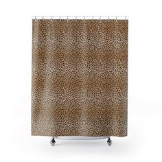 a shower curtain with a leopard print on it