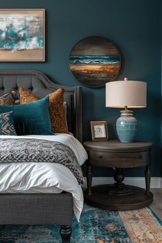 a bedroom with teal walls and blue accents