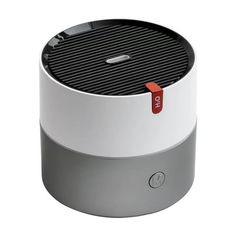 an image of a white and grey speaker with red accents on the front side,