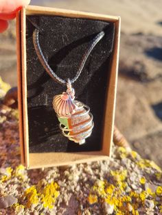 Discover the magic of our green sea glass pendant necklace, found near the enchanting Hook Lighthouse. Each piece carries a piece of the Irish coast's beauty. Choose your chain, embrace the coastal charm! 💚🌊 This is the perfect gift for you or someone special this Christmas or for any special occasion. The Sea Glass Locket is filled with genuine sea glass of different colors collected from a beach in the Republic of Ireland, Europe. It is an original piece of art made with real sea glass. The pieces inside the locket are not sealed but placed closely together, so they create a unique mosaic-like picture.The stainless steel glass locket comes in silver, gold, or rose gold color. The chain is available in different lengths ranging colours. This listing includes: ✮ 1x Gold/Silver/Rose gold Aventurine Amulet Necklace For Gifts, Spiritual Aventurine Jewelry For Gifts, Wire Wrapped Sea Glass Jewelry Gift, Wire Wrapped Sea Glass Jewelry For Gifts, Green Amulet Style Crystal Necklace For Gift, Unique Handmade Sea Glass Necklaces, Natural Stones Sea Glass Jewelry Gift, Sea Glass Jewelry With Natural Stones Gift, Gift Aventurine Pendant Crystal Necklace