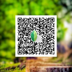 a qr - code with an image of a green leaf on the left side