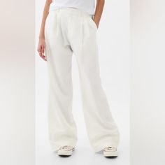 Our Soft-Structured, Effortless Essential Now In A Linen Blend. Soft Linen-Cotton Blend Trousers. E-Waist With Concealed Hook And Bar Closure, Zip Fly. Front Slant Pockets, Back Welt Pockets. Certain Styles Have Allover Prints. Gap Wide Leg Pants For Spring, Classic Gap Pants For Spring, Gap Wide-leg Spring Pants, Elegant Gap Straight Leg Bottoms, Gap Spring Full Length Pants, Gap Spring Full-length Pants, Gap Spring Pants, Spring Gap Pants, Gap Spring Wide-leg Pants