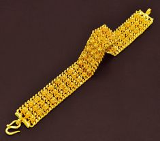 Traditional Yellow Bracelets For Formal Occasion, Yellow Bracelet Jewelry For Festivals, Yellow 22k Gold Bracelets For Formal Occasions, Yellow Gold Jubilee Bracelet As Gift, Yellow Gold Plated Bracelets As Gift, Yellow Gold Plated Bracelets For Wedding, Yellow Bracelets For Party And Festivals, Yellow Gold Jubilee Bracelet Gift, Yellow Bangle Bracelets For Festivals