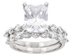 Bella Luce® white diamond simulant 7.88ctw rectangular cushion and round, rhodium over sterling silver ring with band. Measures approximately 0.88" L x 0.38" W and is not sizable. Diamond equivalent weight is 4.78ctw. White Cubic Zirconia Diamond Ring In Radiant Cut, White Cubic Zirconia Diamond Ring Radiant Cut, White Cubic Zirconia Radiant Cut Ring, White Radiant Cut Cubic Zirconia Diamond Ring, White Radiant Cut Cubic Zirconia Ring, White Diamond Cut Square Cut Ring, White Rings With Center Stone Square Cut, Dazzling White Square Cut Diamond Ring, Dazzling White Cushion Cut Rings