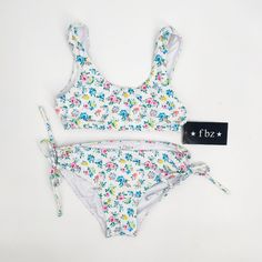 Girls White Floral Two Piece Bikini Swimsuit. Size: Xl Fabric: 80% Nylon, 20% Spandex Garment Care: Hand Wash New With Tags! Summer Beachwear Tankini For Playwear, Fitted Summer Playwear Tankini, Stretch Tankini For Beach Playwear, Fitted Tankini For Playwear And Beachwear, Playful Fitted Tankini For Poolside, Stretch Summer Tankini, Playful White Tankini For Swimming, Playful Fitted Swimwear For Playwear, Beachwear Swimwear With Triangle Top For Play