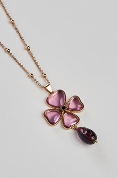 Set on a delicate, matinee-length gold chain, this lightweight necklace showcases a chunky floral pendant in Purple. Create a statement set by adding our Floral Droplet Earring. Droplet Earrings, Floral Pendant Necklace, Floral Pendant, Gold Chain, Gold Chains, Pendant Necklace, Chain, Purple, Pendant