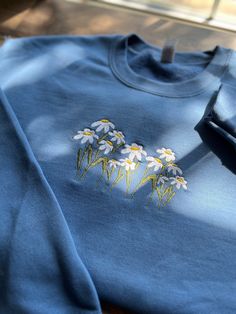 Wildflowers Embroidered Crewneck Daisy Crewneck Daisy - Etsy Spring Crew Sweatshirt With Embroidered Logo, Spring Crew Neck Sweatshirt With Embroidered Logo, Spring Sweatshirt With Embroidered Logo And Crew Neck, Spring Cotton Sweatshirt For Everyday, Cotton Sweatshirt For Everyday Spring Wear, Spring Crew Sweatshirt With Embroidered Text, Cute Embroidered Sweatshirt For Spring, Spring Blue Sweatshirt, Spring Blue Everyday Sweatshirt