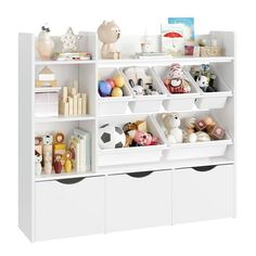 a white book shelf filled with lots of toys