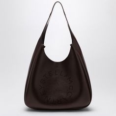 Black Soft Faux Leather Tote Bag From Stella Mccartney Featuring Perforated Circular Logo Detail On The Front, A Top Handle, An Internal Flat Pocket And A Press Stud Closure. Width 35 Cm X Height 28 Cm X Depth 13 Cm Handle Drop: 18 Cm Size Type: Int Material: Polyester Sku: 2f-7b0102w8542/P_stell-2012_100 Welcome To The Official Luosophy Poshmark Closet! Luosophy Is A Luxury Brand Reselling Company Founded In San Diego, Ca From 2016. All Our Products Are Imported From Italy And Sold In The Usa. Ruffles Bag, Faux Leather Tote Bag, Circular Logo, Stella Mc, Stella Mccartney Bag, Black Leather Tote Bag, Black Leather Tote, Mini Tote Bag, Leather Hobo Bag