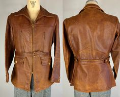 "Stay warm riding out on the range or camping in a canyon in this fantastic 1940s belted back leather jacket! The soft and supple caramel brown ponyhide leather is perfectly broken in with a wonderful aged patina. The jacket features fantastic deco tortoiseshell buttons on the hip pockets, cuffs, belt and waist-adjusters; two vertical brass chain & loop-pull chest pockets, two flap hip pockets, and belted back with bi-swing action behind the arms for movement. Button-on straps for an optional fu Fitted Vintage Outerwear With Belt Loops, Leather Jacket Vintage, Chain Loop, Caramel Brown, Vintage Leather Jacket, Jacket Vintage, Brass Chain, Vintage Leather, Stay Warm