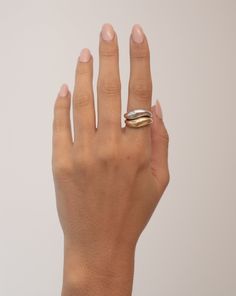 A fluid take on our best-selling Gold Cloud Ring. Wear it solo for understated elegance or stack two together, either in matching metals or mixed, to create a unique and eye-catching look. Shop the full Movement Collection. Elegant Jewelry With Thick Band Tension Setting, Elegant Rings With Tension Setting And Thick Band, Modern Rose Gold Ring Stamped 14k, Yellow Gold Rings With Tension Setting Thick Band, Timeless 14k Gold Bypass Ring, Timeless 14k Gold Jewelry With Tension Setting, Luxury Gold Stackable Rings With Tension Setting, Gold Jewelry With Tension Setting And Thick Band, Gold Wide Band Ring With Tension Setting