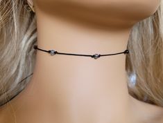 "Rainbow Dragon Vein 4mm gemstones thin black cord choker necklace, this dainty choker is WATERPROOF so you can wear it in the shower or at the beach, and it is adjustable, and one size fits all, when it all the way tightened is 9\" -inch and can open up to 28\" -inches, so it can be a choker or slide the macrame knot out to be a necklace to the length you desire. The beads are all different colors as you see in picture with the dish of beads, I do try to make sure that  you get all different color beads. Love chokers? Check out my choker section ~ http://etsy.me/2Fzrwhu 💜Visit my store for more Awesome Finds💜 https://www.etsy.com/shop/DJsWrapBracelets" Rainbow Dragon, Knot Out, Cord Choker, Trendy Chokers, Gemstone Choker, Red String Bracelet, Dainty Choker, Boho Choker, Macrame Knot