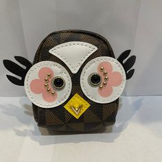 New! Super Cute Owl Backpack Purse Charm/Change Holder! This Measures 3.5 Inches Tall & 3 1/4 Inches Across. Has A Zipper Top That Opens Up And Can Fit Compact Gloss Stick, A Credit Card Or A Few Dollars, Or Just Change. I Was Surprised How Much Stuff I Could Fit Inside. I Carry Around Lens Drops And Fit The Travel Bottle Inside! Love The Little Face And The Print. I Have These In The White, Brown And Pink. Fell In Love With The Design So I Purchased A Ton To Give To My Friends. Can Be Used As A Cute Brown Mobile Phone Bag, Cute Brown Travel Backpack, Cute Brown Bag With Adjustable Strap, Cute Portable Brown Bag, Givenchy Bag Pandora, Owl Backpack, Mini Hand Bag, Louis Vuitton Multi Pochette, Pandora Bag