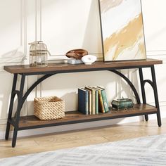 a wooden shelf with books and pictures on it