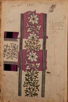 an old book with floral designs on it