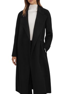 Sleek and sophisticated, this longline belted coat is made from a double-faced, splittable wool blend for a supremely soft interior that matches the exterior. Due to this unique dual construction, blind-seam coats remain warm and comfortable without needing a lining. 45" length (size 8) Front button closure Notched lapels Button-tab cuffs Side welt pockets Removable tie belt Back vent Unlined 82% wool, 18% polyester Dry clean Imported Elegant Wool Coat With Belted Cuffs And Lapel Collar, Elegant Formal Wool Coat With Belted Cuffs, Tailored Chic Structured Wool Coat, Chic Tailored Structured Wool Coat, Luxury Belted Wool Coat With Notch Lapel, Luxury Belted Wool Coat For Formal Occasions, Elegant Fitted Wool Coat With Belted Cuffs, Formal Long Wool Coat With Belted Cuffs, Elegant Black Belted Wool Coat