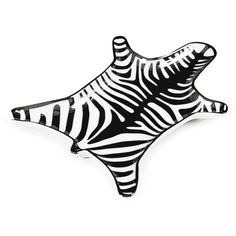 a black and white zebra print plate on a white background with the shape of a starfish