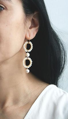 ★★★A modern take on pearls while also keeping it traditional. I've mixed small and large pearls for a unique look. These statement earrings will be a showstopper on your wedding day.+ Freshwater Pearls. 14K Gold Fill Ear Wire. 14K Gold Plate Circles.+ Length: 2.75 inches.+ Earrings take 1 business day to make.+ Your jewelry will come in a jewelry box, tied with a ribbon.➤➤ Have a question about this product, reach out to me here ➙ https://www.etsy.com/conversations/new?with_id=9057464&referr Pearl White Pearl Earrings, Handmade Pearl Hoop Earrings For Weddings, Elegant Hoop Earrings With Pearl Chain For Wedding, White Pearl Cluster Earrings With Pearl Drop, White Akoya Pearl Drop Earrings, White Pearl Embellished Hoop Earrings For Wedding, Elegant Pearl Chain Hoop Earrings For Wedding, Pearl Beaded Drop Earrings With Pearl Charm, Elegant Pearl Beaded Earrings With Pearl Charm