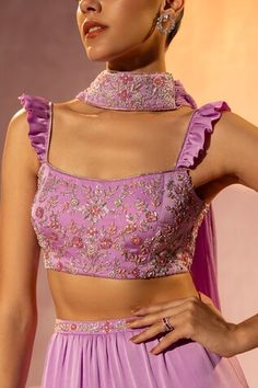 Lilac tiered lehenga with embroidered waistband. Paired with zardozi, bead, cutdana embroidered padded blouse in floral pattern and dupatta. - Aza Fashions Sleeveless Ruffled Set For Reception, Fitted Sleeveless Organza Set, Sleeveless Ruffled Reception Set, Traditional Sleeveless Sets With Ruffles, Fitted Sleeveless Ruffle Choli, Tiered Lehenga, Padded Blouse, Lehenga Blouse, Purple Satin