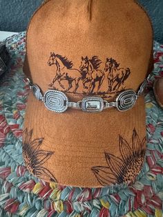 I'm excited to share my new Running Horses with sunflower. Silver western hat chain.  One size fits most.  Colors: Golden Beige,  gray, Dark Sage green and pink  This hat has snaps in the back to adjust to your head size.  Message me and I can personalize it with a bible verse, special saying, name, or a date. Sage Green And Pink, Cowboy Hat Band, Hat Chain, Cowboy Hat Design, Hat Burning, Dark Sage Green, Custom Cowboy Hats, Suede Hat, Dark Sage