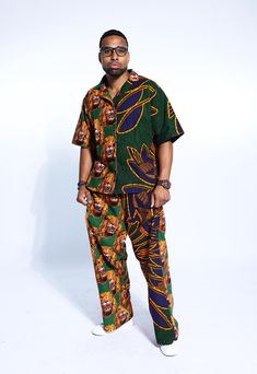 PRODUCT DETAILS: Designed in the U.S., hand-crafted in Africa Delivery within 2 weeks Multiple prints available This exceptional, Igbo Traditional multi-colored shirt and pants set, made of unique cotton African Isi Agu print fabrics, will make you stand out with the pops of color and provide a nice, laid back sense of style! This unisex shirt & pant can be worn as evening wear to various events such as weddings, dinner parties and other formal occasions. FABRIC CARE: Dry Clean. Hand Wash. Machine Wash. SIZE CHART: Casual Multicolor Long Sleeve Pant Set, Casual Printed Cotton Sets, Casual Patterned Cotton Sets, Relaxed Fit Multicolor Cotton Sets, Multicolor Cotton Pant Set For Summer, Multicolor Matching Short Sleeve Pant Set, Casual Multicolor Printed Pant Set, Patterned Cotton Short Sleeve Sets, Patterned Cotton Sets With Short Sleeves