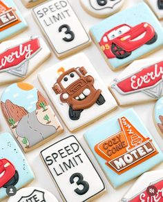 cookies with cars and numbers on them are arranged in the shape of magnets that say speed limit