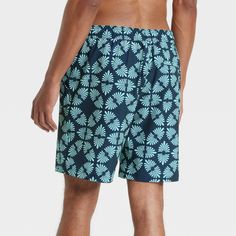 This 4-Way Stretch Elevated Elastic Waist Trunk Swimsuit from Goodfellow & Co™ feature a blue botanical-inspired motif pattern for an attractive look. Made from 4-way stretch, quick-drying fabric, these regular-fit swim trunks are designed with a built-in boxer for comfort in or out of water. A front drawstring on the elastic waist offers you a secure fit, while the UPF 50+ rated material helps keep you protected from the sun. Plus, the side and back pockets provide space to keep small essential Motif Pattern, Comfortable Flats, Printed Swim, Mesh Material, Leaf Print, Swimwear Fashion, Lining Fabric, Boxer Briefs, Swim Trunks