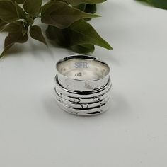 Welcome Dear Buyer, Spinner Ring, Sterling Silver Ring for Women, Boho Wide Band Fidget Ring, Hammered Handmade Meditation Ring SOLID 925 STERLING SILVER RING UNIQUE BAND RING HANDMADE RING DESIGNER RING MAGNIFICENT PRESENT PRESENT RING PRESENT FOR YOU AND YOURS LOVED ONE  Jewellery Care Instructions :- -Avoid contact with all liquids and chemicals, such as perfume, sea water, mayonnaise, ammonia, chlorinated pool water, hair spray and sweat. -Remove your jewellery before  going to bed. -Avoid direct sunlight, heat and cold, especially stay away from humidity.  -Remove jewellery when bathing, showering or swimming.  -Remove jewellery when participating physical activates and cleaning gardening. -Clean the jewellery each use and occasionally wipe with a soft cloth. -Jewellery should be stor Handmade Wide Band Stackable Rings For Anniversary, Artisan Nickel-free Rings For Anniversary, Handmade Stackable Wide Band Rings For Anniversary, Bohemian Wide Band Rings For Anniversary, Artisan Wide Band Ring For Anniversary, Handmade Wide Band Stackable Rings As Gift, Hammered Wide Band Ring Gift, Unique Wide Band Stackable Rings As Gift, Artisan Stackable Rings For Anniversary