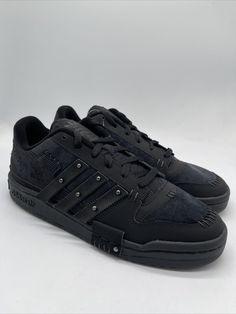 Introducing the adidas Originals Forum Exhibit Low in Black, available in Men's sizes 5.5-10. This sneaker showcases adidas' iconic style and quality with its low top shoe shaft, athletic type, and GW8726 style code. The Forum Exhibit Low is perfect for men who want to stay stylish and comfortable in their daily routine or during light physical activities. This adidas Originals sneaker is a great addition to any shoe collection and is perfect for those who want to express their fashion sense. The Forum Exhibit Low comes in black and features the adidas Originals product line, making it a great choice for those who want to stay trendy. Get your pair today and experience the comfort and style that only adidas can offer. Adidas Low-top Skate Shoes, Custom Low-top Adidas Sneakers For Skateboarding, Adidas Logo Custom Low-top Sneakers For Streetwear, Adidas Urban Low-top Skate Shoes, Urban Adidas Low-top Skate Shoes, Urban Adidas Low-top Custom Sneakers, Urban Adidas Low-top Sneakers, Urban Adidas Logo Low-top Sneakers, Urban Low-top Adidas Skate Shoes