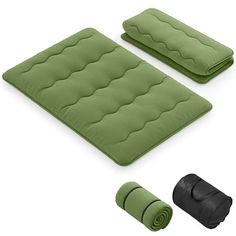 an inflatable mattress and two yoga mats