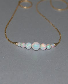 Opal Necklace Tiny Dot Necklace Small Opal by ModernJewelBoutique Gold And Opal Jewelry, White Opal Necklace With Delicate Chain, White Opal Round Bead Necklaces, White Opal Bead Necklaces, White Opal Round Beads Necklace, Opal Aesthetic, Iridescent Jewelry, Horizontal Bar Necklace, Blue Opal Necklace