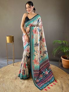 Indulge in the epitome of grace and sophistication with this stunning cream silk saree adorned with exquisite Kalamkari print work and delicately attached tassels on the pallu. Boasting 5.50 meters of sheer elegance, this saree is the perfect embodiment of timeless beauty and contemporary charm, making it an ideal choice for your upcoming festivals, occasions, and other special functions.
The subtle yet captivating allure of the cream color silk saree exudes a sense of understated elegance, whil Affordable Art Silk Pre-draped Saree With Pallu, Luxury Ikat Print Saree For Diwali, Luxury Diwali Saree Digital Prints, Luxury Kalamkari Print Saree Set, Luxury Kalamkari Print Pre-draped Saree For Puja, Luxury Elegant Saree With Kalamkari Print, Luxury Kalamkari Print Choli For Saree, Luxury Kalamkari Print Salwar Kameez For Festive Occasions, Affordable Traditional Art Silk Saree