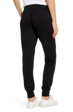 Supersoft and stretchy, these joggers have a slim yet relaxed fit that feels right at home in your casual wardrobe. 27 1/2" inseam Elastic/drawstring waist Front slant pockets 95% modal, 5% spandex Machine wash, tumble dry Made in the USA t.b.d. Black Lounging Bottoms With Comfort Waistband, Black Bottoms With Comfort Waistband For Lounging, Relaxed Fit Pull-on Joggers For Loungewear, Black Lounging Bottoms With Ribbed Waistband, Black Bottoms With Ribbed Waistband For Lounging, Stretch Straight Leg Joggers For Leisure, Leisure Straight Leg Stretch Joggers, Black Cotton Joggers For Lounging, Loungewear Tapered Leg Sweatpants With Elastic Side Panels