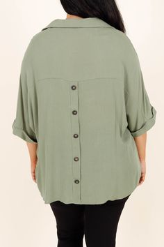 We are so in love with this top! It is the perfect way to feel comfortable and look stylish! Its flowy fit allows for ease of movement, while its gorgeous sage color adds a subtle touch of elegance! Ideal for a day out or day in the office, the Carefree Top is the ideal wardrobe staple! 100% Rayon Green Relaxed Fit Blouse For Layering, Casual Light Green Fall Top, Casual Light Green Top For Fall, Versatile Green Top For Spring, Green Solid Color Tops For Layering, Green Tops For Layering, Chic Relaxed Fit Khaki Top, Oversized Green Blouse For Day Out, Versatile Oversized Green Top