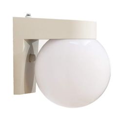 a light that is on the side of a white wall mounted fixture with a round glass ball