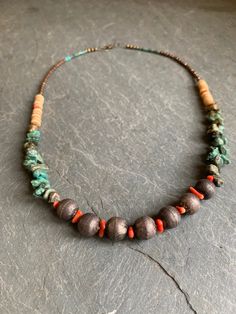 Spiritual Turquoise Necklace With Patina, Spiritual Turquoise Patina Necklace, Unique Turquoise Necklace With Patina, Unique Turquoise Necklace With Round Beads, Earthy Turquoise Beaded Necklaces With Round Beads, Earthy Turquoise Necklaces For Jewelry Making, Rustic Round Beads Necklace For Jewelry Making, Rustic Turquoise Hand-strung Necklace, Rustic Beaded Necklaces For Jewelry Making