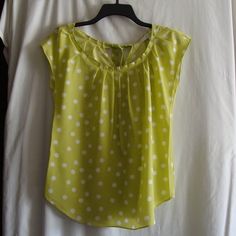 Light & Airy. Perfect For Warmer Weather! Cap Sleeve Blouse, Scoop Neck With A Back Tie Closure Tuck Pleat Detail Along Neckline 100% Polyester - Machine Wash Measurements(Approx): Shoulder: 12.5" Sleeve: N/A Bust: 18.5" Length: 19" Cute Fitted Green Blouse, Cute Polka Dot Top For Spring, Cute Spring Polka Dot Tops, Cap Sleeve Blouse, Green Cap, Cap Sleeves Blouse, Pleated Blouse, Spring Green, Lc Lauren Conrad