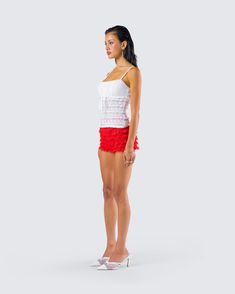 A little frill and flounce moment to elevate your day 🤍 With layers of charm, this two-piece set pairing a white strappy lace top with red ruffle shorts will have you causing waves everywhere you go 💋 Black Off Shoulder, Graphic Top, Ruffle Shorts, White Jersey, Pocket Pants, White Mini Dress, No Frills, Best Sellers, Lace Top