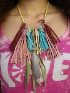 Be kind to the earth with this stylish Eco friendly statement piece, made from upcycled leather with feather detail. Stand out from the crowd with a fringed leather necklace in earthy colours, to complement your festival wardrobe. Festival Jewellery, Upcycled Leather, Organic Jewelry, Feather Necklace, Festival Jewelry, Feather Necklaces, Leather Fringe, Earthy Colors, Leather Necklace