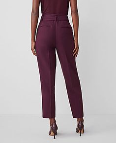 Elevate your wardrobe with the sophisticated charm of Ann Taylor's Petite Belted Taper Pants in a stunning Plum Rose hue. Perfect for the modern professional, these pants blend functionality with style.

- **Size:** Petite 8
- **Color:** Plum Rose
- **Material:** 79% Polyester, 17% Rayon, 4% Spandex
- **Gender:** Female
- **Fit:** Tailored and fitted
- **Rise:** High rise, sits 1/2" to 1" below natural waist
- **Length:** Hits at ankle, 25" inseam with 15" leg opening
- **Leg Shape:** Tapered, n Spring Tapered Pants With Belt Loops, Fitted Tie Waist Pants For Work, Fitted Work Pants With Tie Waist, Fitted Pants With Tie Waist For Workwear, Tie Waist Bottoms For Workwear, Fitted Paperbag Waist Bottoms For Workwear, Fitted Bottoms With Paperbag Waist For Workwear, Belted Bottoms For Workwear, Fitted Paperbag Waist Pants For Workwear