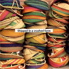 colorful baskets stacked together with the caption shipped in a crushed form