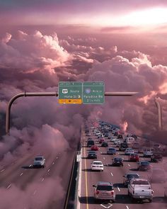 an image of a freeway with cars on it in the sky and clouds behind them