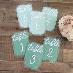 the table numbers have been painted green and white