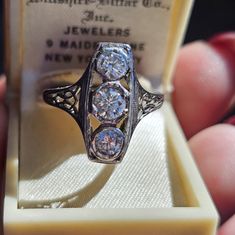 18k Antique Diamond Ring Size 7 3/4. Stamped 18k. Amazing And Hard To Find. Middle Stone About 4.5mm Side Stones About 4mm. Estimated .33 Center And .25 Sides Making It Almost 1 Carat Total Weight Estimate (Could Be More) As Stones Have Been Set For Over 100 Years. This Has Amazing Finger Coverage. I'm Parting With Some Of My Antique Collection! Follow For More! See All Pics As They Are A Part Of The Description! See My Other Listings For Sterling Silver, Solid 10k, 10kt, 417 , 585, Solid 14k, 14kt Solid 18k, 18kt, Diamonds, Sapphire, Emerald, Garnet, Jade, Amethyst, Citrine, Ruby, Topaz, Other Precious Stones, And Other Jewelry Key Words: Kay's, Jared, Zales, Engagement, Anniversary, Bi Heirloom Jewelry In 14k White Gold With Diamond Accents, Heirloom Jewelry With Diamond Accents In 14k White Gold, Heirloom Three Stone Platinum Ring, Heirloom Three-stone Platinum Ring, Heirloom Platinum Three Stone Ring, Heirloom Platinum Three-stone Ring, Heirloom White Gold Diamond-cut Jewelry, Heirloom White Gold Jewelry With Diamond Cut, Three Stone Diamond Ring In 14k Silver Gold