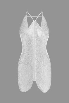 a women's white bodysuit with spaghetti straps and an open back, on a gray background