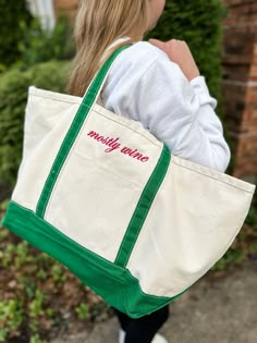 The 90s are back, but totes never left us. Embroider any cheeky message, name, or inside joke on this versatile tote. Our most popular heavyweight tote is now available in a large size.  The large bag is a great overnight or beach bag option. Perfect for a day by the water, to keep all the crap together, or even an overnight trip, this classic style boat tote in a variety of strap colors can be monogrammed or embroidered with your choice of phrases. Up to 12 characters per line, up to 3 lines of Green Bag With Embroidered Logo For Everyday Use, Trendy Embroidered Logo Tote Shoulder Bag, Trendy Shoulder Bag With Embroidered Logo For Everyday Use, Trendy Shoulder Bag With Embroidered Logo, Trendy Everyday Shoulder Bag With Embroidered Logo, Trendy Bags With Embroidered Logo For Daily Use, Trendy Bag With Embroidered Logo For Everyday, Trendy Everyday Bag With Embroidered Logo, Retro Green Cotton Bag