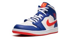 The Air Jordan 1 Mid “Knicks” is a colorway of the casual sneaker that features the team uniform colors of the New York Knicks.  The “Knicks” Jordan 1 Mid is not officially associated with the basketball team, but still features its uniform colors on its design in an intriguing way.  The shoe sports a white leather base with Game Royal leather overlays on the toe, forefoot, eyelets, collar, and heel.  A Rush Orange leather Swoosh is found on either side of the shoe and orange “Wings” branding ap Nike Air Jordan 1 Mid, Team Uniforms, Basketball Team, Stadium Goods, Nike Air Jordan 1, Air Jordan 1 Mid, Orange Leather, New York Knicks, Jordan 1 Mid