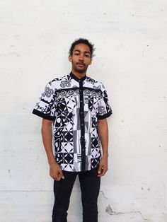 Dress up and go for a party. Or wear casual with jeans. Chinese collar. Short sleeves. Black and white african print fabric. Original ghanian fabric.  Patchwork zero waste shirt made of leftover pieces. Patterns may vary but all are beautifully unique and handmade. 100% cotton. Made in Ghana. Short Sleeve Patchwork Shirt For Streetwear, Patchwork Short Sleeve Shirt For Streetwear, White Collared Shirt With Geometric Pattern, Fitted White Patchwork Shirt, Fitted Patchwork Short Sleeve Shirt, African Print Shirts For Men, Ankara Shirts For Men, African Print Shirt, Chinese Collar