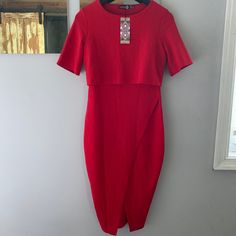 Never Worn With Tags. Red Asymmetrical Dress. Size 6/M. Red Midi Dress With Asymmetrical Hem For Date Night, Red Asymmetrical Hem Midi Dress For Date Night, Red High-low Hem Dress For Spring, Red Chic Fitted Asymmetrical Dress, Chic Red Asymmetrical Fitted Dress, Chic Red Fitted Asymmetrical Dress, Red Fitted Knee-length Asymmetrical Dress, Red Fitted Asymmetrical Knee-length Dress, Red Midi Dress With Asymmetrical Neckline For Date Night